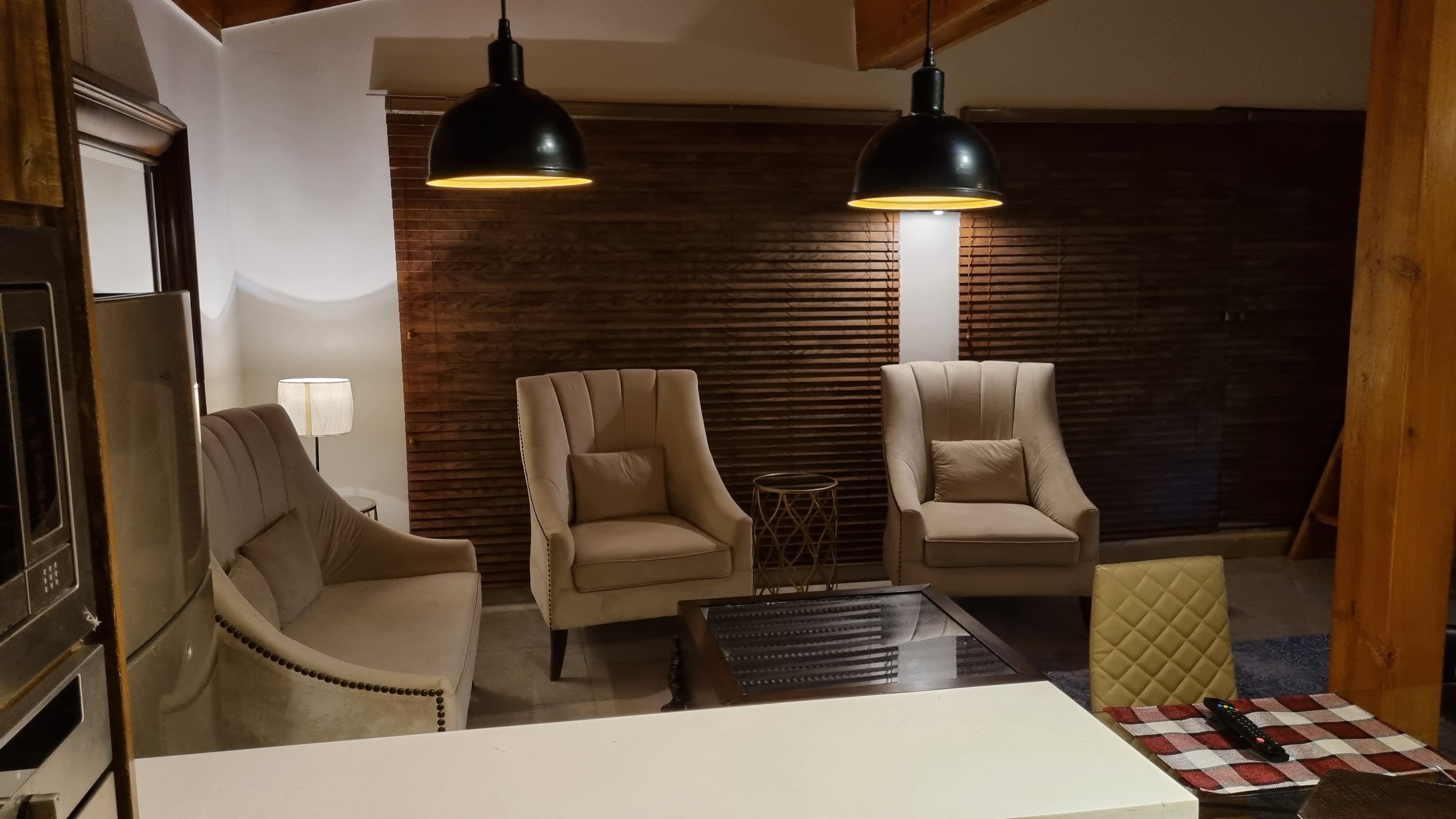 modern cottage living room with fireplace, comfortable seating, contemporary decor